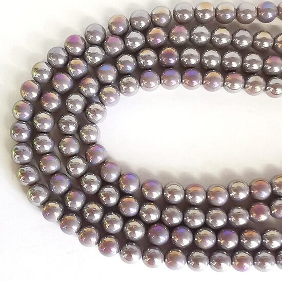 10 mm pelēcīgi violeta ar spīdumu. Stikla pērļu virtene ar pārklājumu