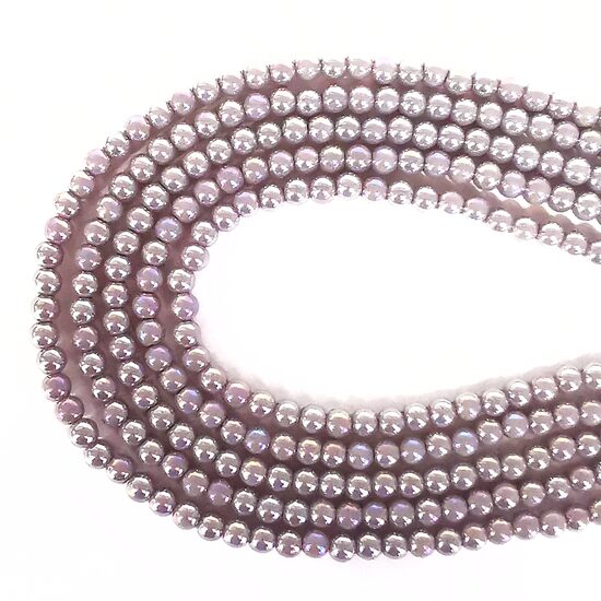 6 mm  gaiši pelēcīgi lillā ar spīdumu. Stikla pērļu virtene ar pārklājumu