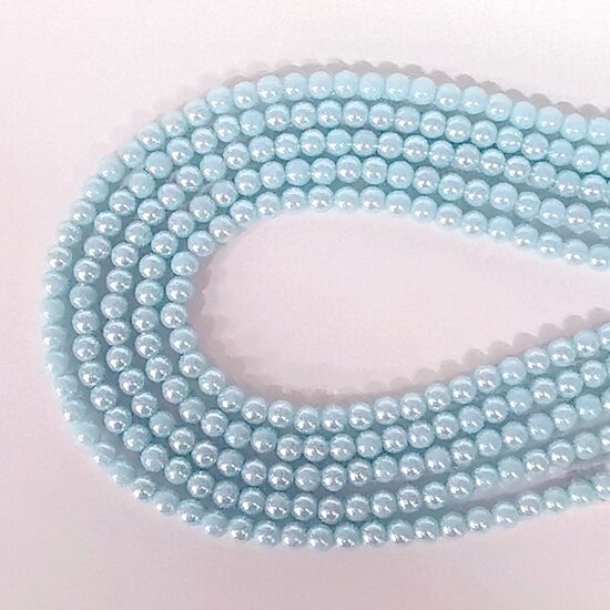 6 mm gaiši zila ar spīdumu. Stikla pērļu virtene ar pārklājumu