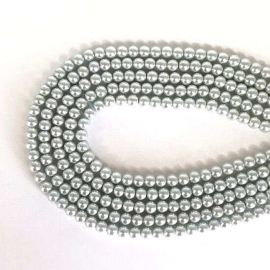 6 mm pelēcīgi gaiši zila. Stikla pērļu virtene ar pārklājumu