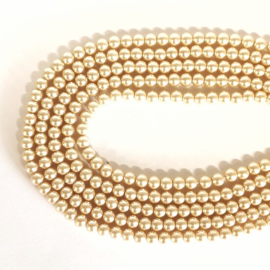 6 mm gaiši bēša. Stikla pērļu virtene ar pārklājumu 