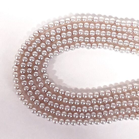 6 mm gaiši lillā. Stikla pērļu virtene ar pārklājumu